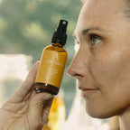 Solar-infused Vitamin C mist enriched with chamomile, green tea, and lemon balm – revitalizing facial spray